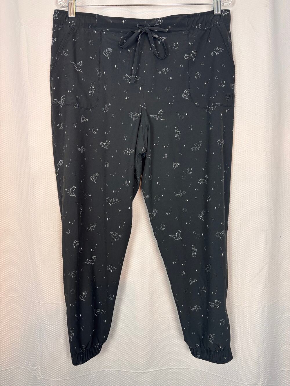 Albion Fit black constellation with playful bats print joggers lots of pockets